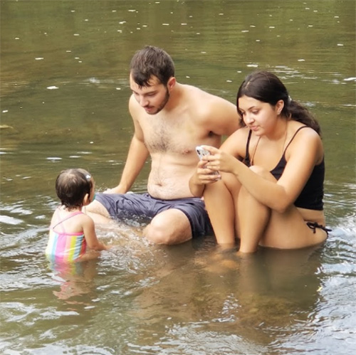 Family Swimming in Elk River, Kansas