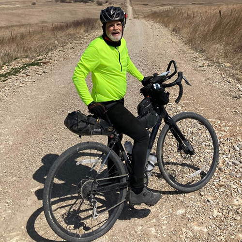 Man biking by Elk Falls RV Park